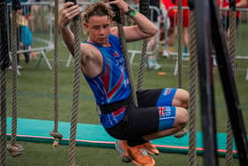 Obstacle racer Aaron Johns in action