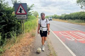James Lewis on the A5 near Milton Keynes, edging ever closer to his hometown of Rugeley as he enters the final miles of his extraordinary fundraising challenge for St Giles Hospice.
