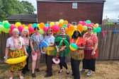 The Cygnet Health Care service hosted a charitable Hawaiian-themed summer party, which raised £122 for Dementia UK
