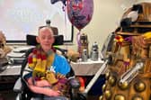 Resident Richard Mortan with the life-sized props