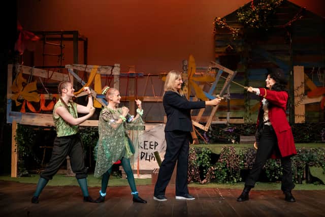 Kim (centre) joined some of the cast members on stage at their dress rehearsal