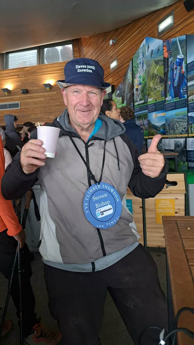 Steve with a well earn cuppa at the Snowdon cafe at the top