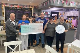 Access in Dudley Chair Karl Denning and Patron Alderman Steve Waltho MBE present a cheque for £2,468 to Lunch on the Run. The donation, funded through the estate of former Access in Dudley Chair Tina Boothroyd, will sponsor a trainee and buy a new mixer
