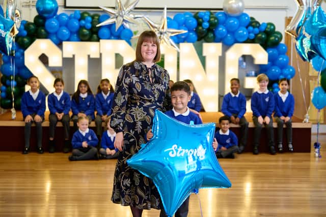 Mrs Adams, Headteacher with pupils from Blowers Green Primary