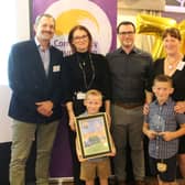 Nick Owen, of the Owen Family Trust (left), with Laura Pearson (second left) and fellow Gnosall residents 