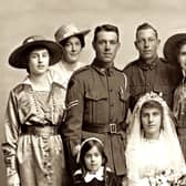 The book details the search by Colin Reid for information about Claude, pictured with Violet and her family on their wedding day in May 1918