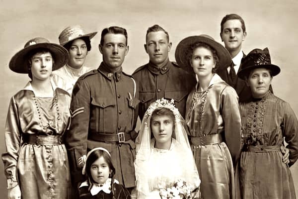 The book details the search by Colin Reid for information about Claude, pictured with Violet and her family on their wedding day in May 1918