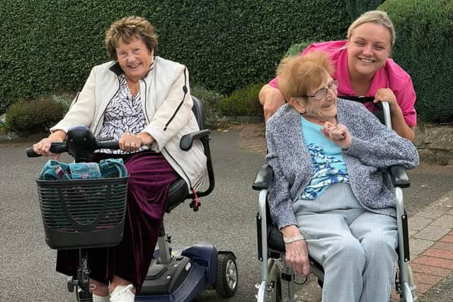 Well-being Assistant, Vicky Cooper, with residents June Abbiss and Joan Pearce.