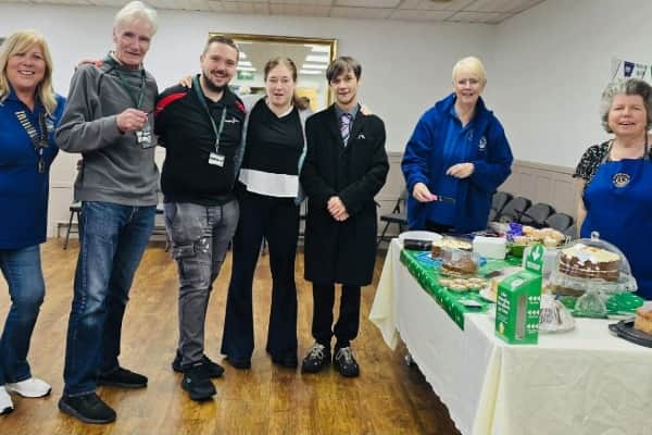 Lion President Debra Coburn and Lion Jane , with members of Rugeley Town Council and Owen Allen, Manager of Rugeley Rose Theatre