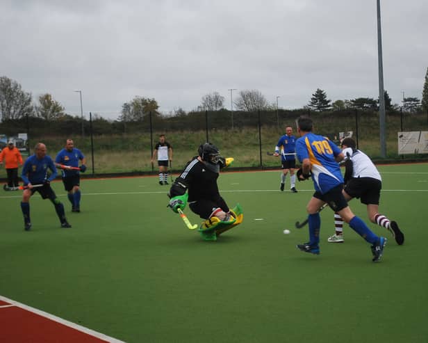 Stourport's keeper saves from Worcester 4th's.