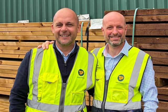 Picture: Dave Stretton (left) and Dan Storer (right) who have both worked for Travis Perkins for 30 years.