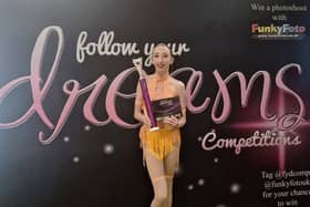 Kayla Adams-Kolmer is celebrating after being crowned a National Champion at a UK dance competition in Blackpool