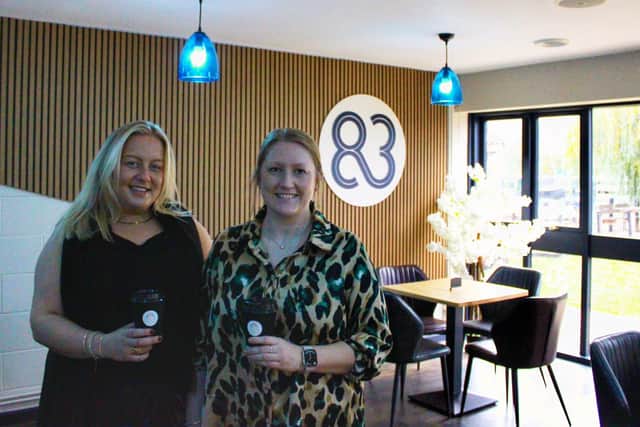 Inside the newly refurbished Café 83, Jess Avery, Community Fundraising Manager, and Lisa Thompson, Community and Events Support Officer, enjoy a coffee ahead of its opening next week.