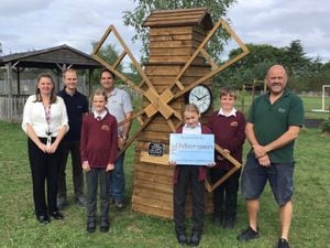 Michelle Moseley, Tim Tranter, Andy Williams and Karl Pedley with year 5 eco committee members Megan Soames, Jessica Evans and Jacob Poulsom