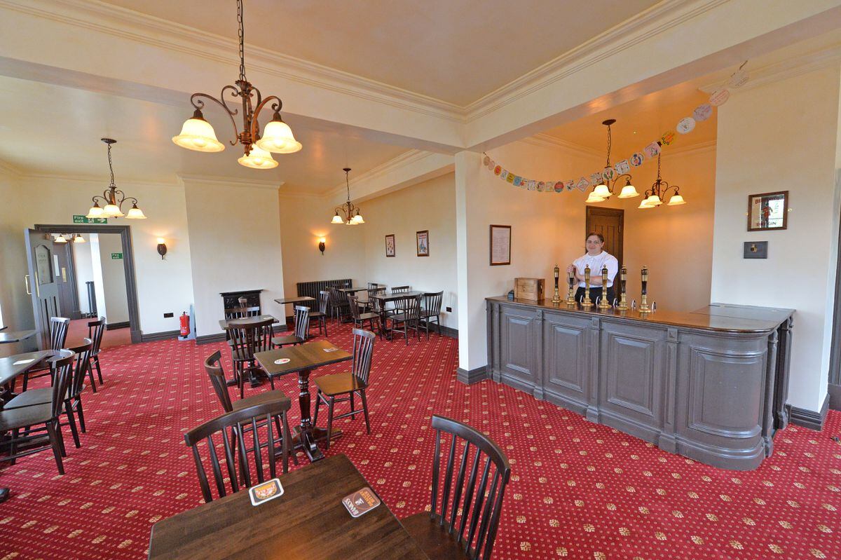 The upstairs lounge has a fully-stocked bar and can be used as a party room