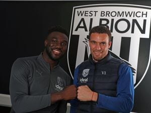 Daryl Dike signs for West Bromwich Albion pictured with Valerien Ismael Head Coach / Manager of West Bromwich Albion at West Bromwich Albion Training Ground on January 1, 2022 in Walsall, England. (Photo by Adam Fradgley/West Bromwich Albion FC via Getty Images).
