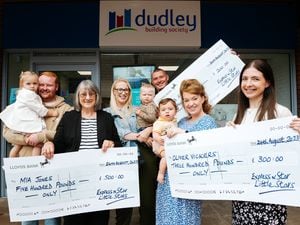 The three top-placed Little Stars, from left: Mia Jones, two, with dad Kurt Jones and great-grandmother Ann Jones; David Hill, 18 months, with mother Danni McCarthy and father David Hill Sr; and Oliver Vickers, 11 months, and mum Lindsey Vickers; with Amy Cowdell from Dudley Building Society