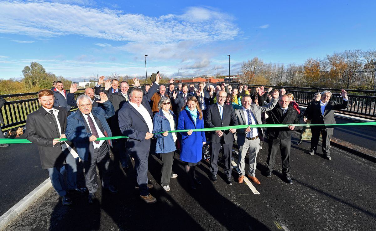 The ribbon-cutting ceremony for the new road