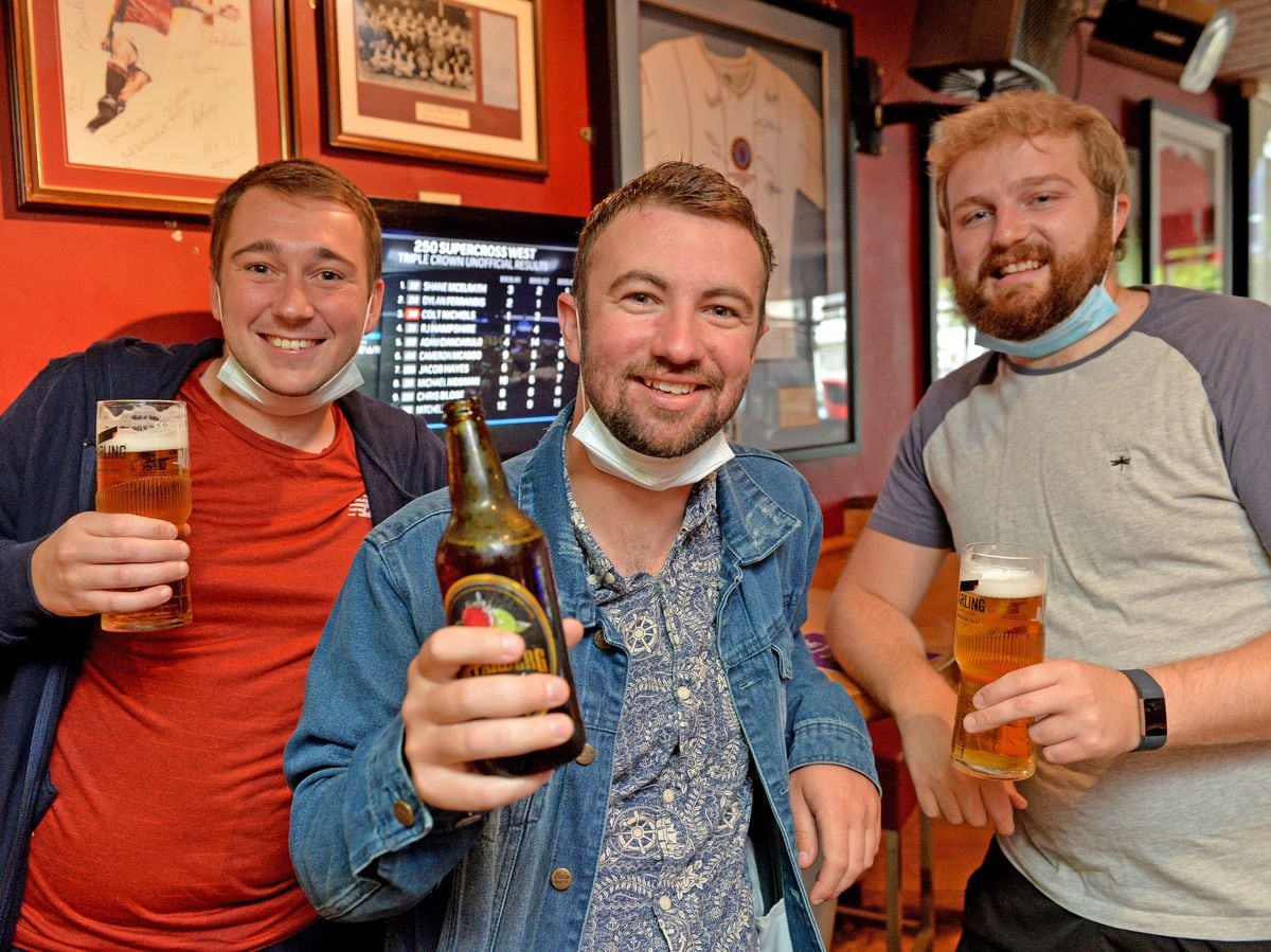 Ryan Turner, Jake Aston and Josh Matthews enjoy a breakfast drink at Bar Sport in Cannock