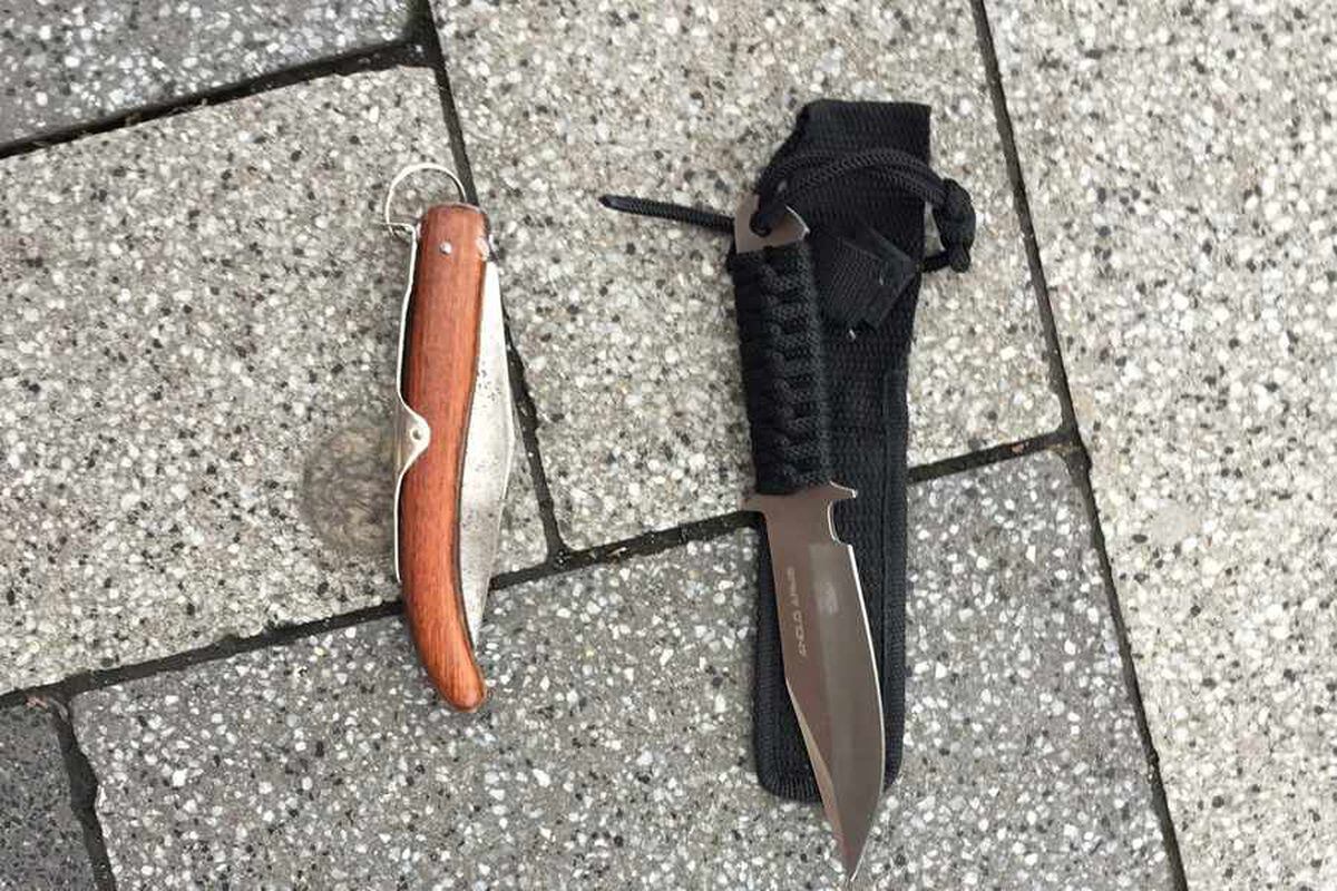 Two of the knives collected from the bin