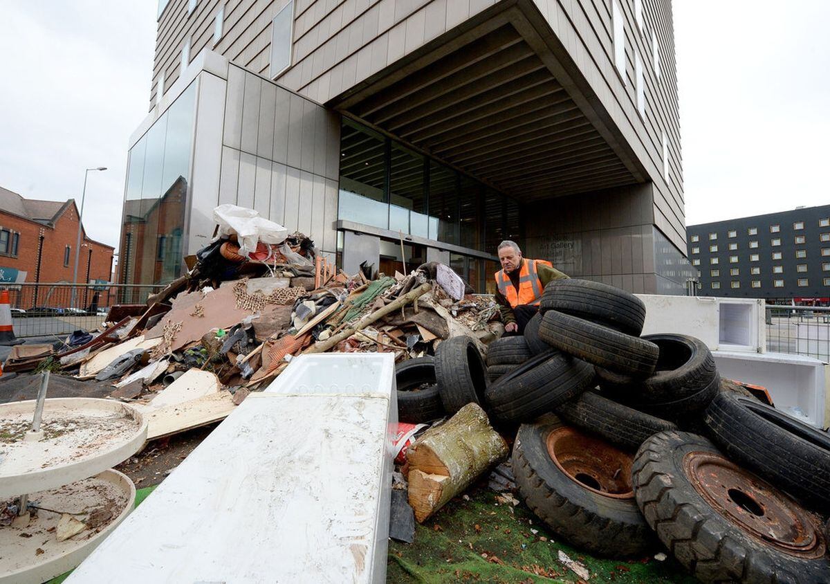 A huge pile of rubbish was dumped next to New Art Gallery, Walsall, to raise awareness of fly-tipping