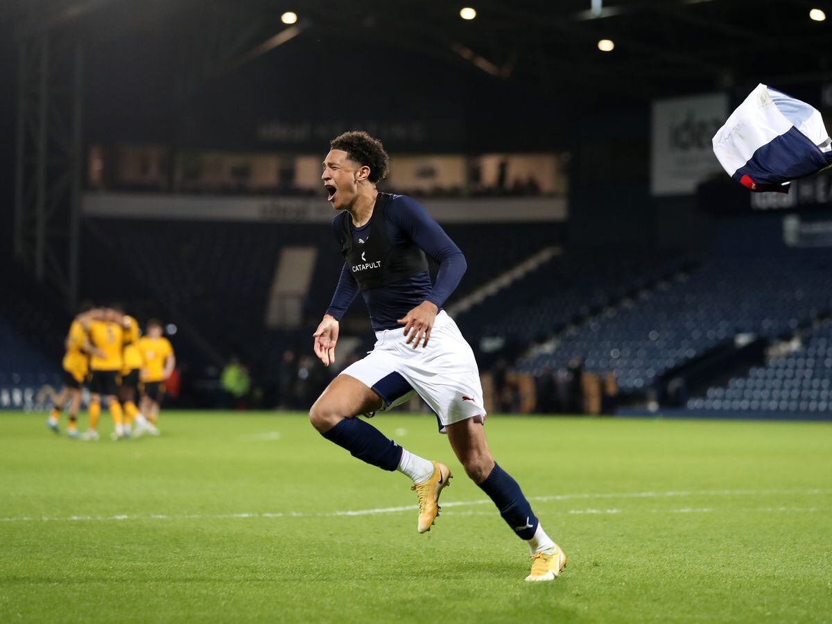 Ethan Ingram of West Bromwich Albion celebrates after scoring a penalty to make it 5-4 after penalty shoot out during the West Bromwich Albion U23 v Wolverhampton Wanderers U23: Premier League Cup Final at The Hawthorns on May 13, 2022 in West Bromwich, England. (Photo by Adam Fradgley/West Bromwich Albion FC via Getty Images).