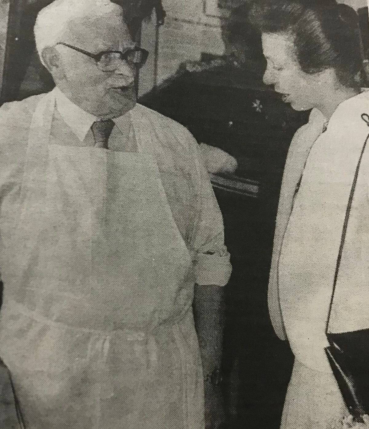 The Princess Royal talks to Frank Egan, who demonstrated the craft of edging leather.