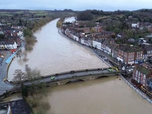 The River Severn has breached its bank onto grassed land by Bewdley Bridge. Image: centraldroneimaging.co.uk