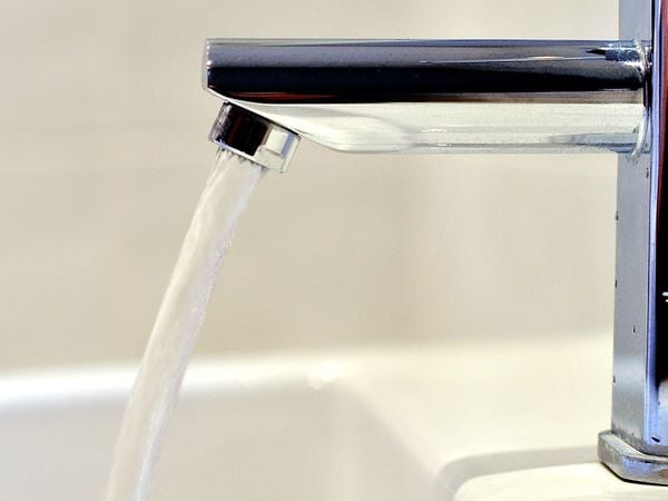 Water runs from tap