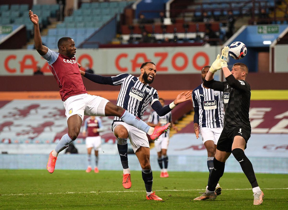 Aston Villa striker Keinan Davis (left) scores against West Brom last season. 