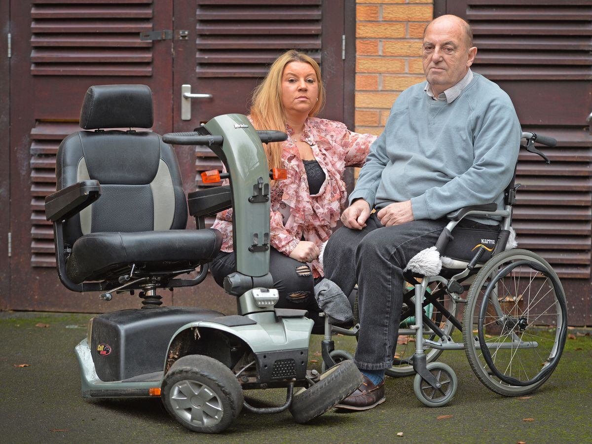 Paul Harrison with his carer Sheree Smith and the damaged mobility scooter
