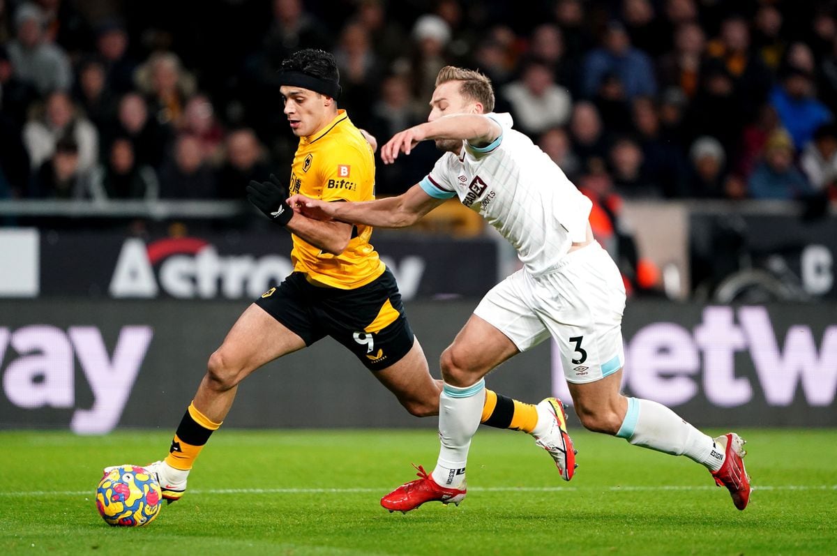 Wolverhampton Wanderers' Raul Jimenez (left) and Burnley's Charlie Taylor battle for the ball 
