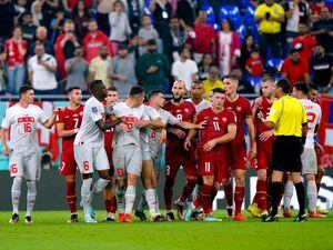 Switzerland and Serbia players clash