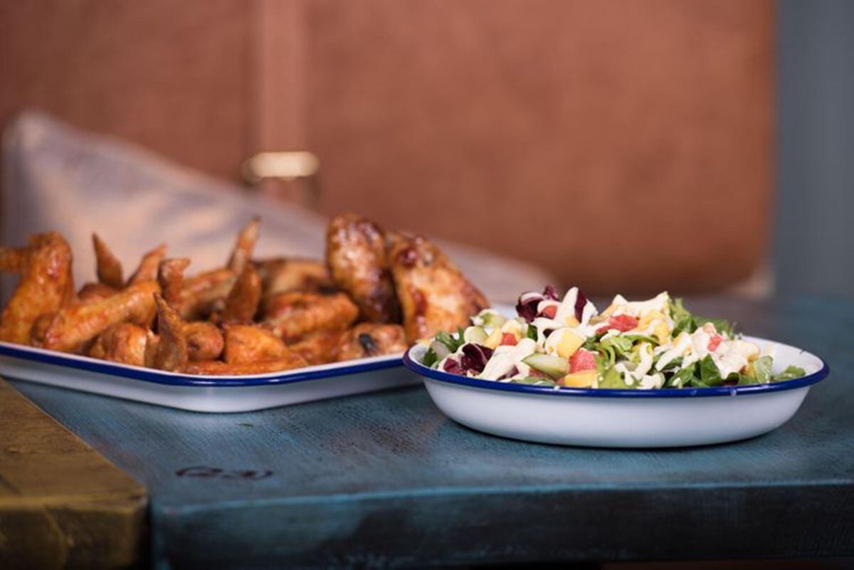Would you like fries with that? There’s a number of side dishes from fries and chicken wings to salads