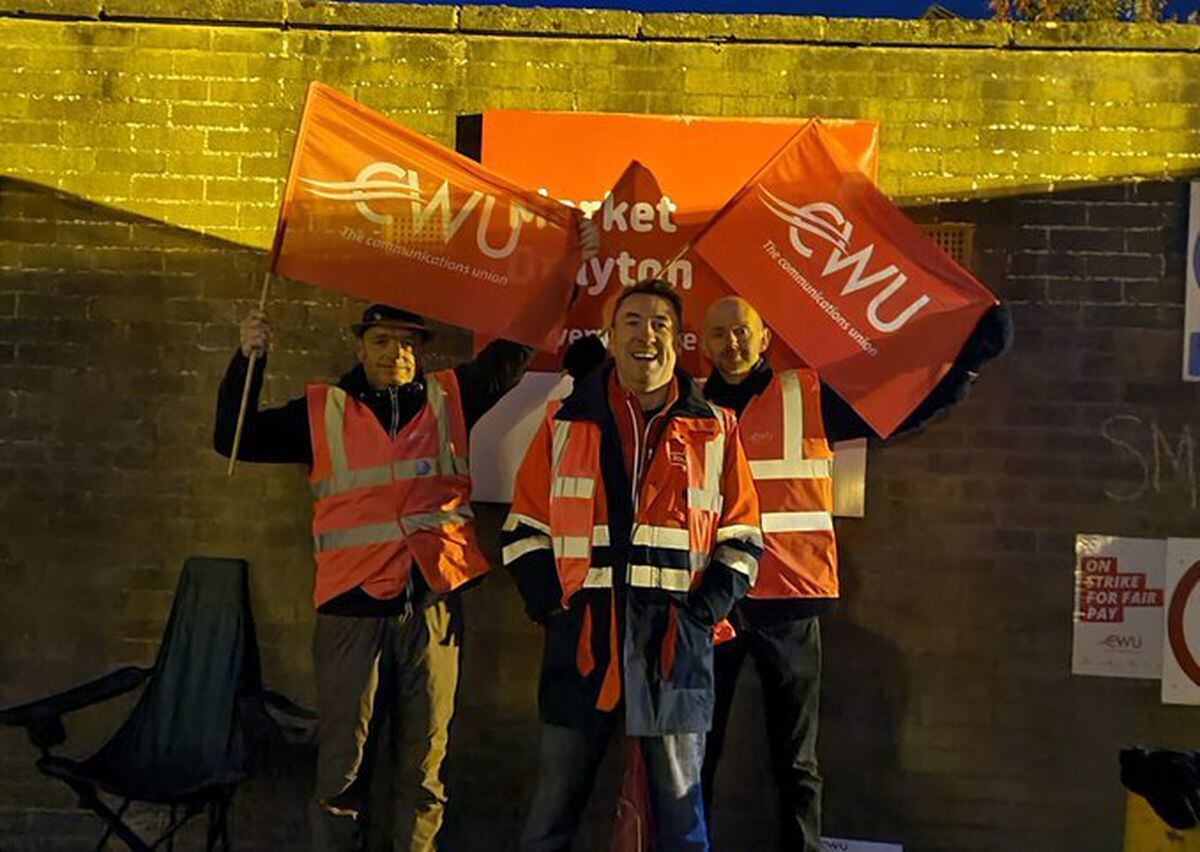 Postal workers striking outside Market Drayton delivery office early this morning, Photo: CWU