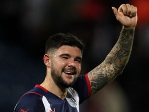 WEST BROMWICH, ENGLAND - SEPTEMBER 25: .Alex Mowatt of West Bromwich Albion fist-pumps the West Bromwich Albion Fans at the end of the match as he celebrates the 2-1 win in the Sky Bet Championship match between West Bromwich Albion and Queens Park Rangers at The Hawthorns on September 25, 2021 in West Bromwich, England. (Photo by Adam Fradgley/West Bromwich Albion FC via Getty Images).