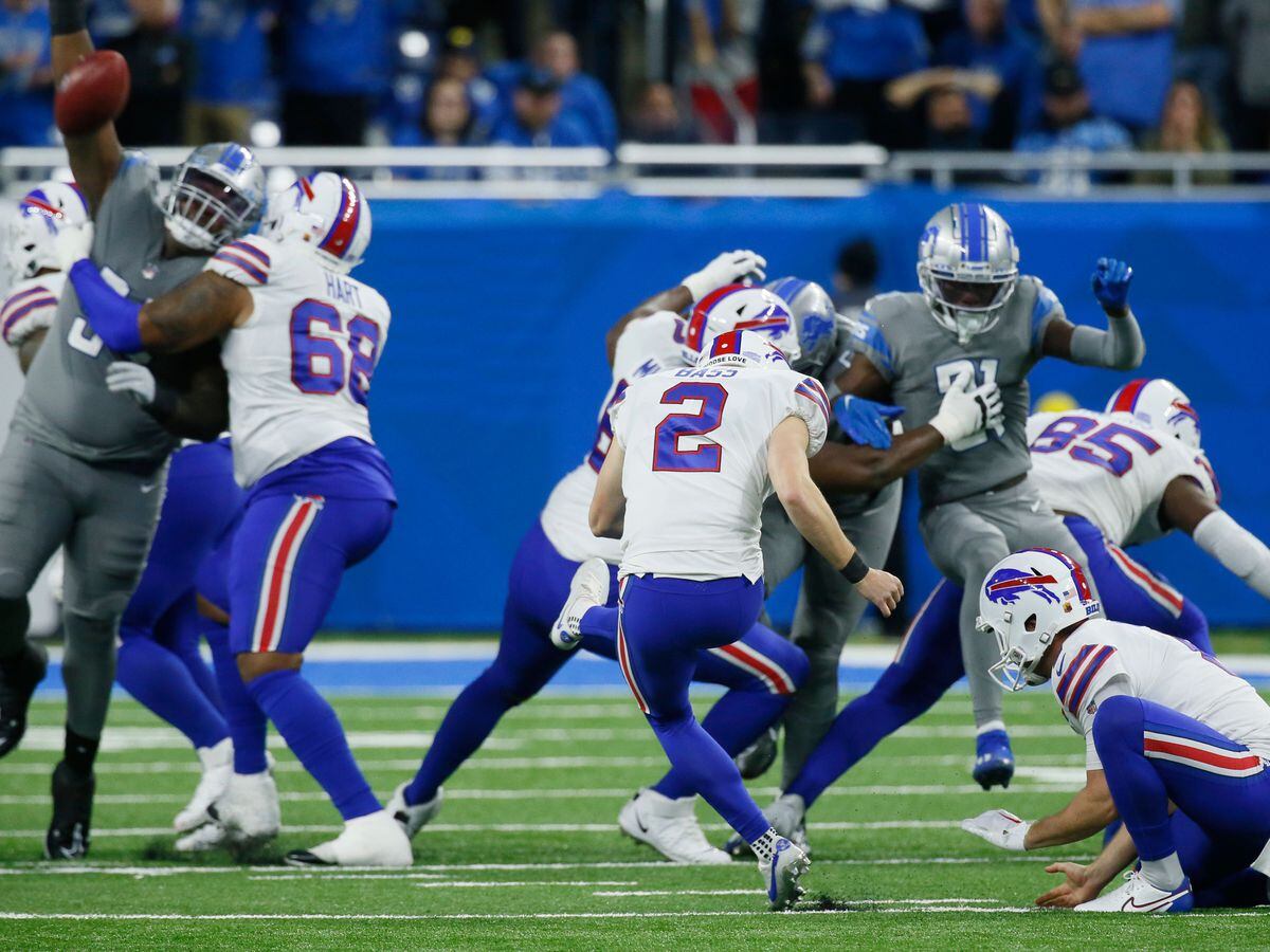 Buffalo Bills place kicker Tyler Bass (2) kicks a 45-yard game winning field goal in the closing seconds of an NFL football game against the Detroit Lions, Thursday, Nov. 24, 2022, in Detroit.