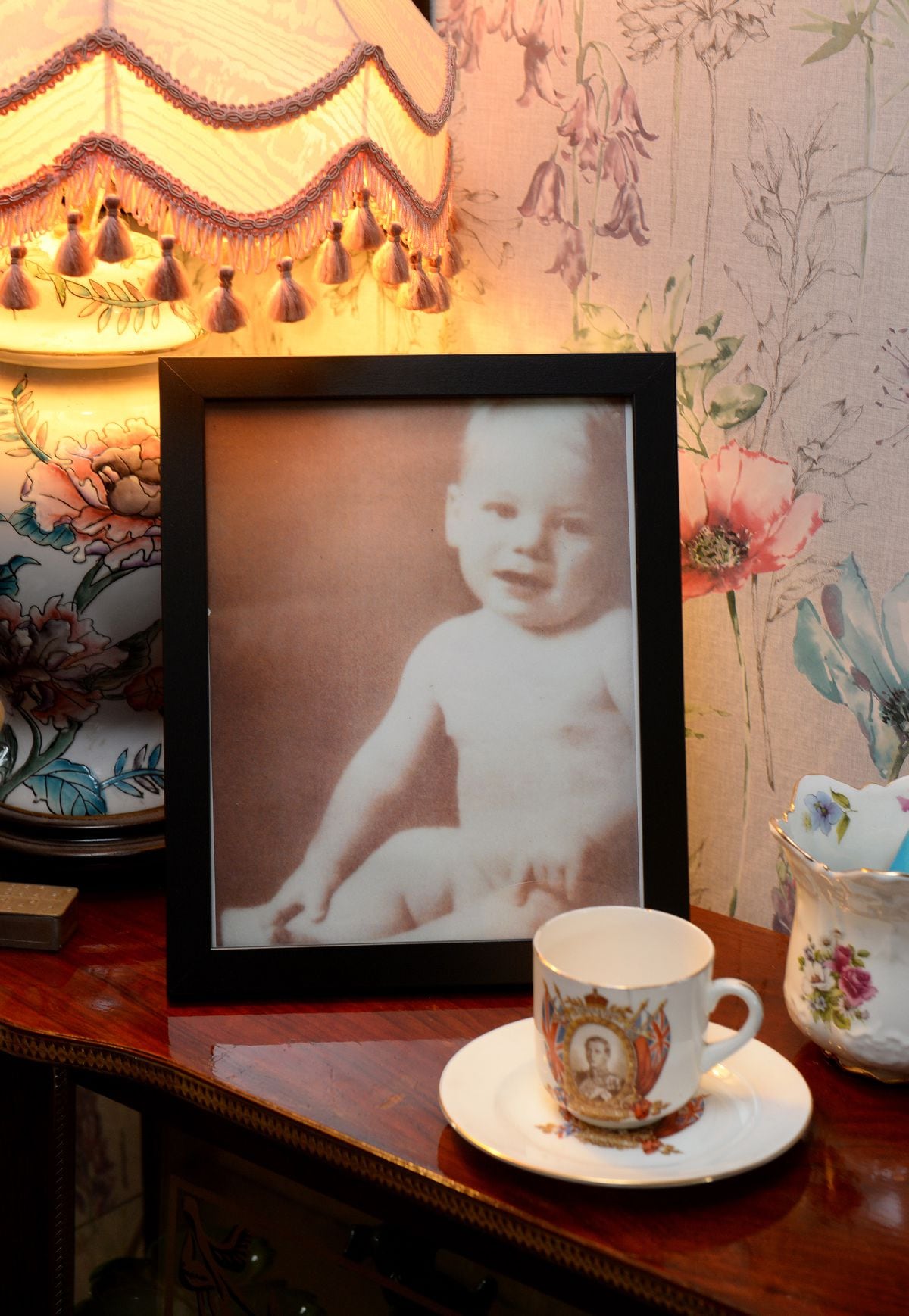  A picture of Duncan as a baby on the mantelpiece