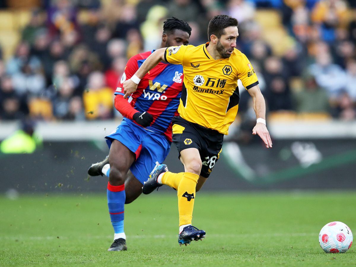 Joao Moutinho of Wolverhampton Wanderers runs with the ball during the Premier League match between Wolverhampton Wanderers and Crystal Palace at Molineux on March 05, 2022 in Wolverhampton, England. (Photo by Jack Thomas - WWFC/Wolves via Getty Images).