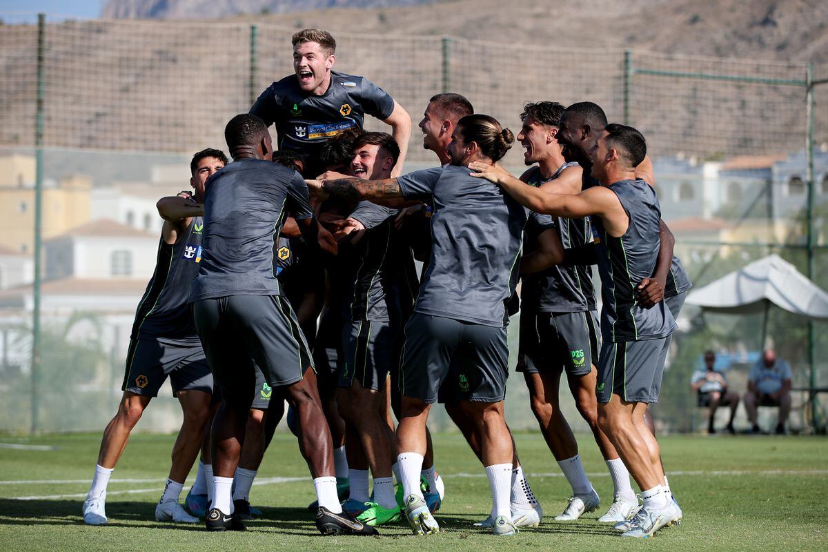 Wolves players celebrate during a pre-season training session (Getty)