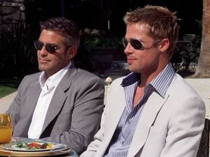 George Clooney and Brad Pitt in 2001's Ocean's Eleven