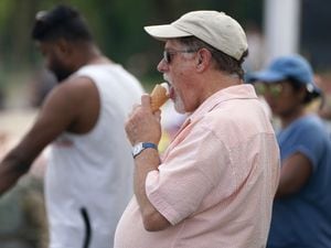 A man enjoys an ice cream