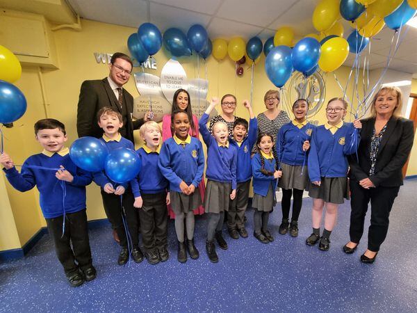 Councillor Chris Burden (Cabinet Member for Education and Skills), joins Deputy Headteacher Kully Kaur, Headteacher Julie Mills, Deputy Headteacher Ange Coles and pupils to celebrate Manor Primary School’s Outstanding Ofsted result with Anita Cliff (CEO at Manor Multi Academy Trust) (right).