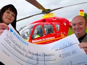 Midlands Air Ambulance Charity Fundraiser Kay Starkey with E5 Group director Kevin Stevens