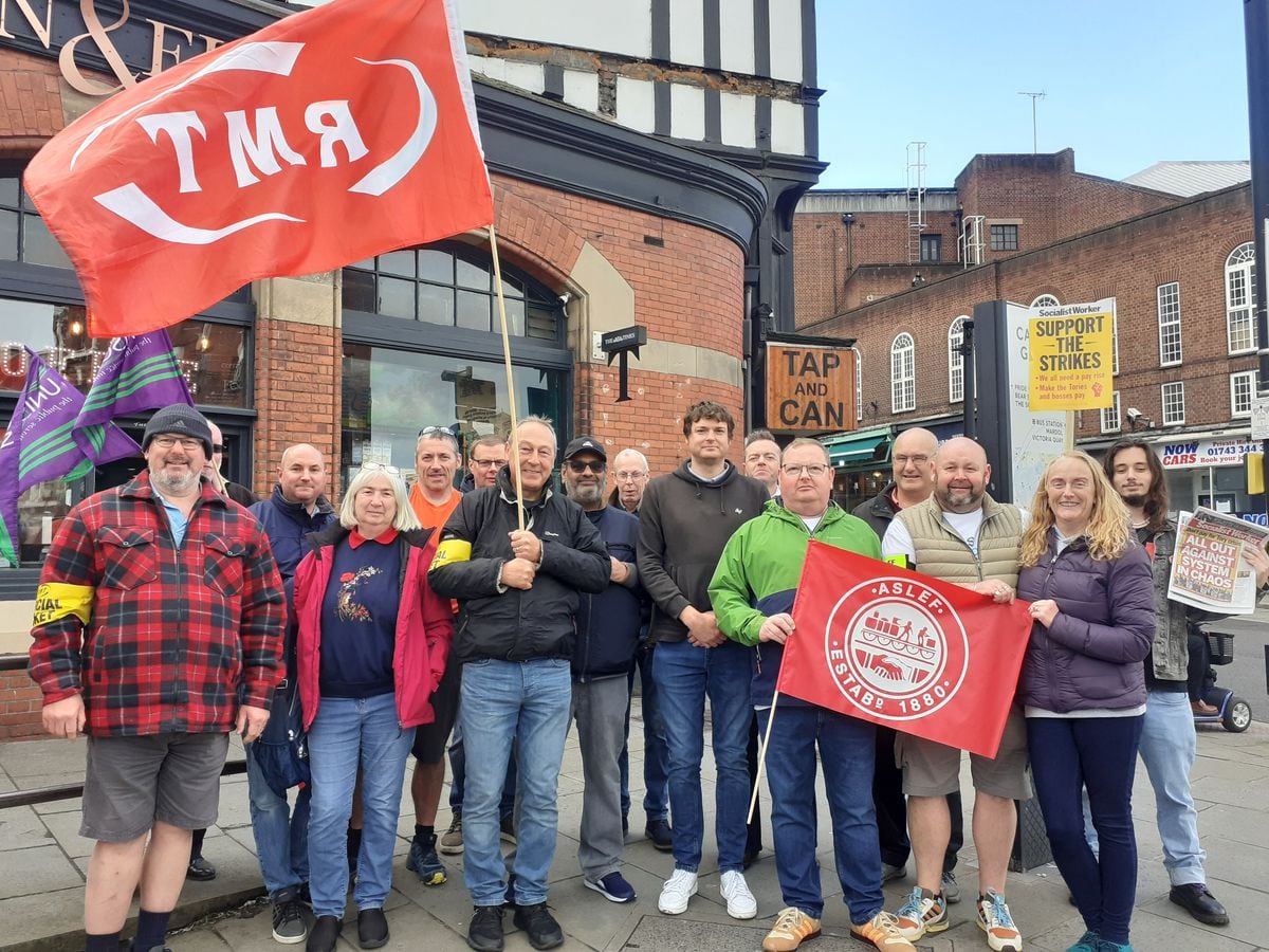 Members of three rail unions and supporting trades unionists gathered at Shrewsbury railway station