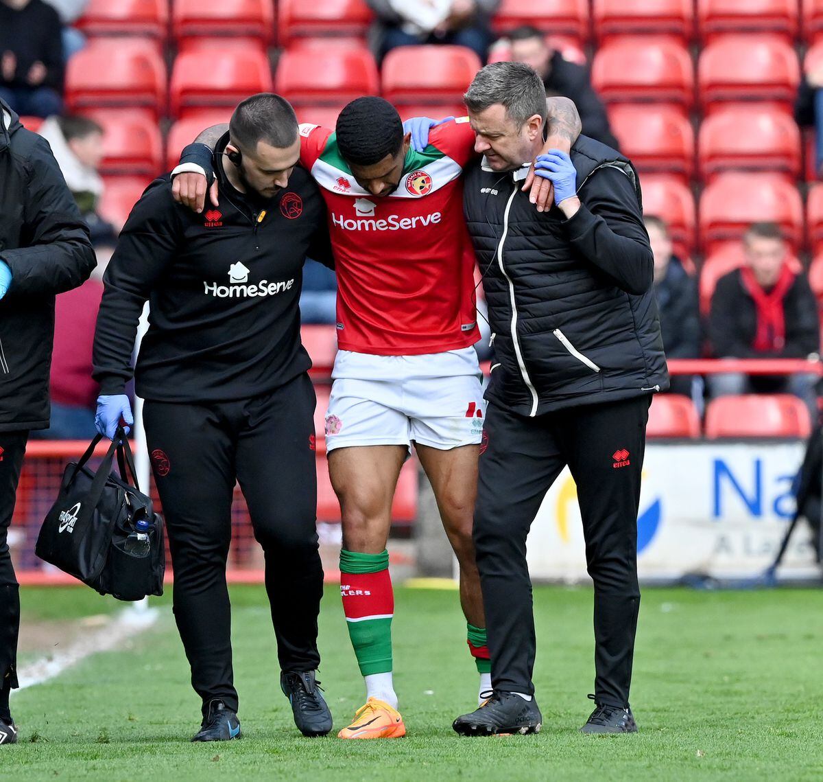 Joss Labadie is helped off the pitch
