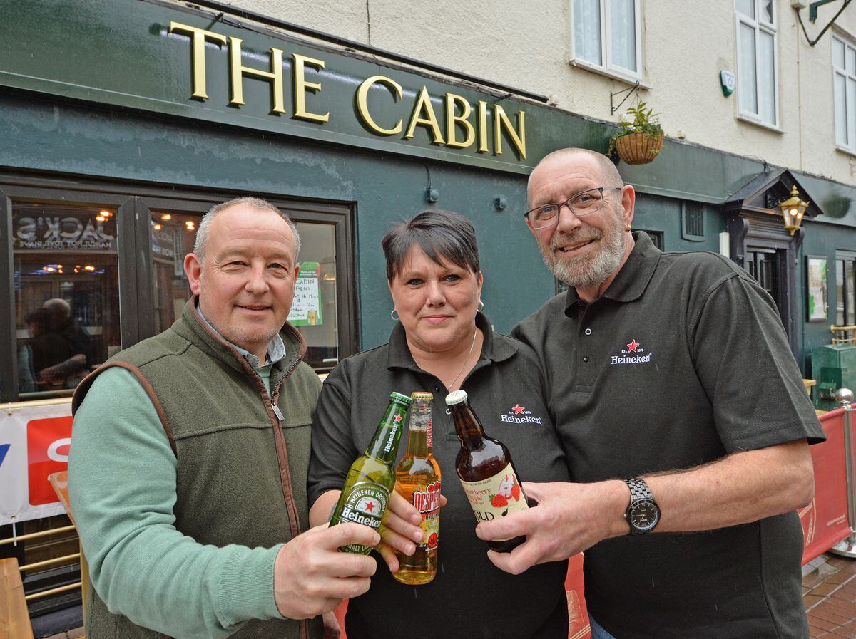 A Rugeley pub is re-opening after a two-and-a-half-year closure as The Cabin. Pictured: Derek Moore, Amanda Frisby and Grahame Frisby.