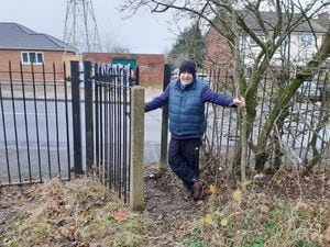 Clive Heywood, standing inside the now unlocked public rights of way gate, at Brandhall Golf Course. Photo: Clive Heywood