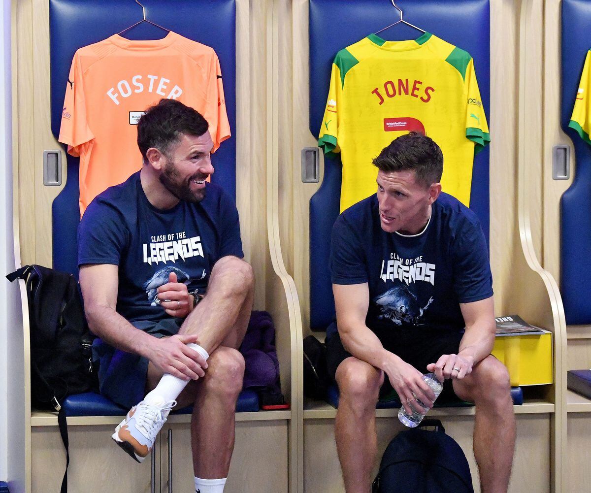 Ben Foster and Billy Jones share a joke before the game