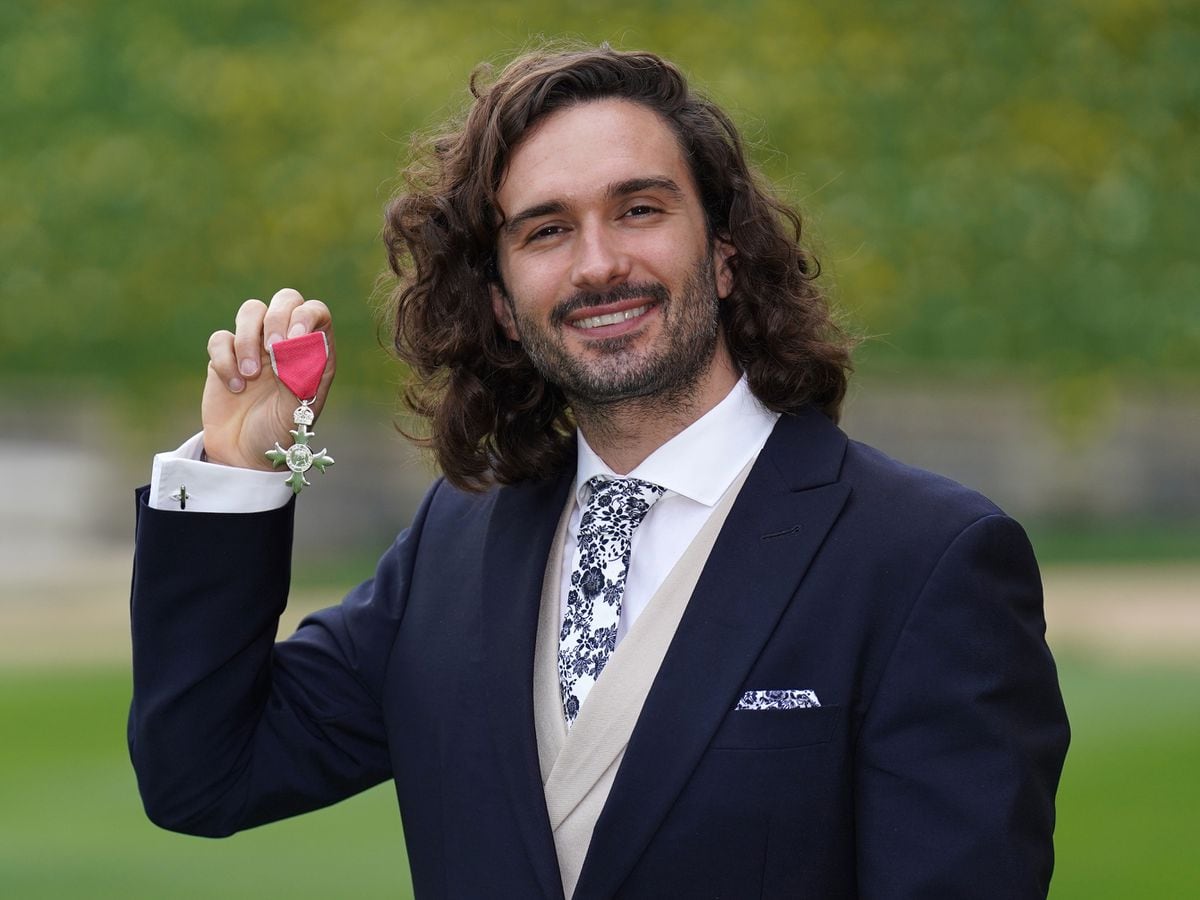 Joe Wicks with his MBE in March